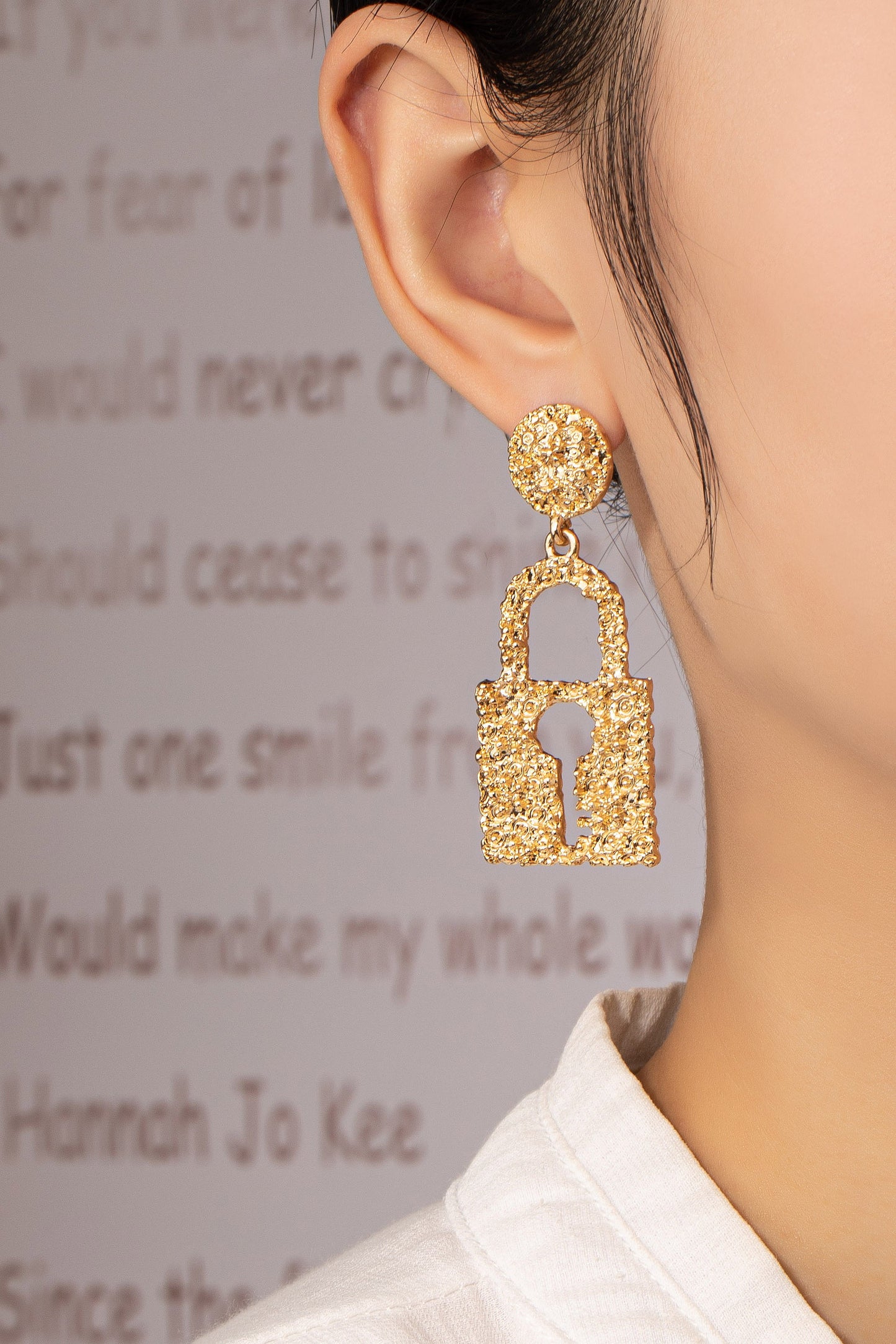 MISMATCHING KEY AND LOCK TEXTURED CASTING EARRINGS