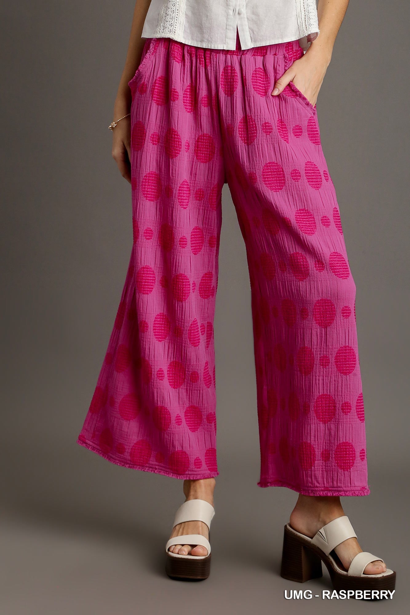 The Dotty Textured Polka Dot Wide Leg Pants in Raspberry