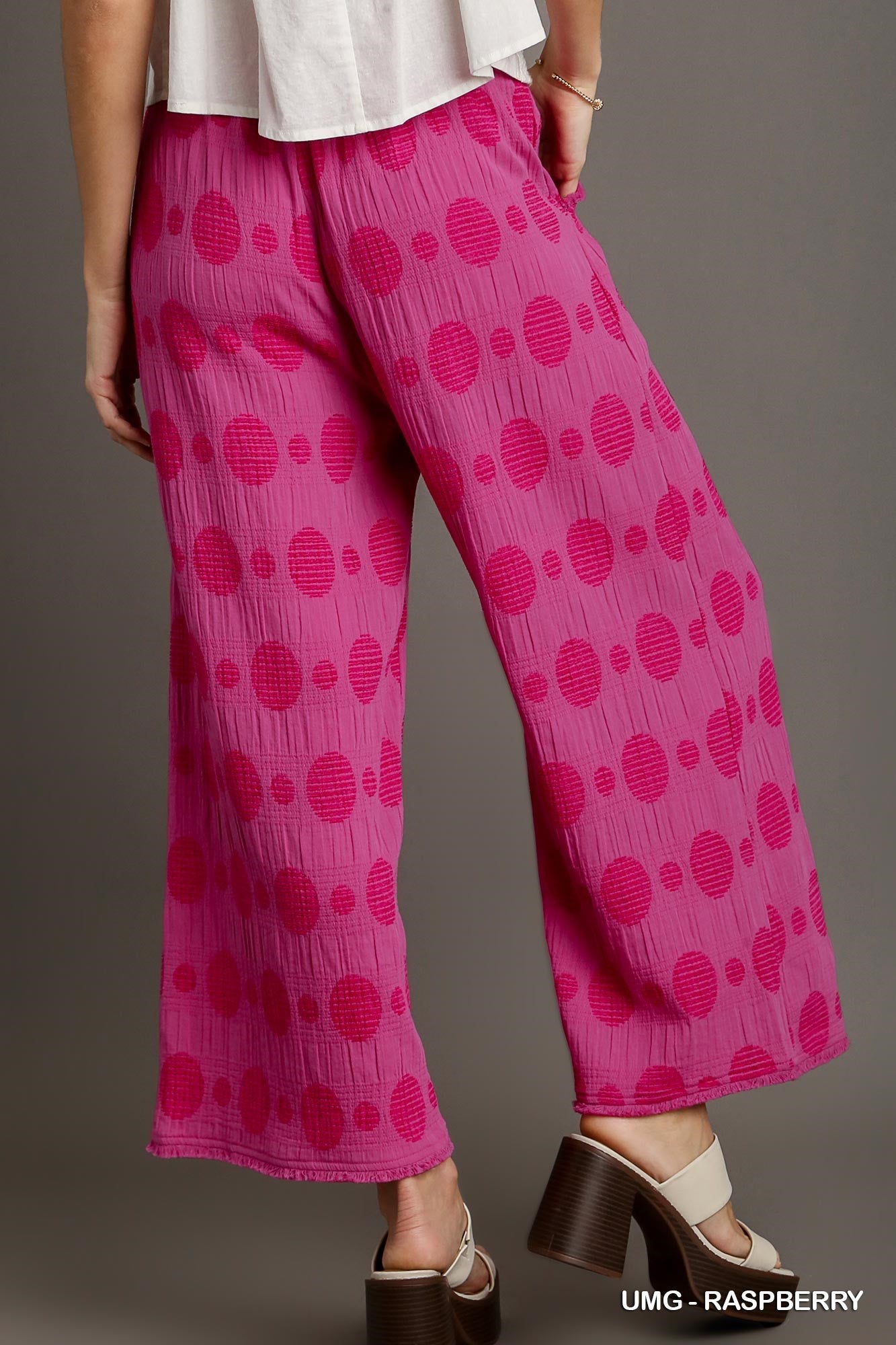 The Dotty Textured Polka Dot Wide Leg Pants in Raspberry